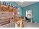 Bright and cheerful kitchen island, with beachy décor and ample workspace, perfect for casual dining and meal prep at 2991 Wood Duck Dr, Polk City, FL 33868