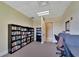 Quiet library with bookshelves, desks, and reading area at 2991 Wood Duck Dr, Polk City, FL 33868