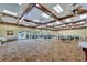 Large meeting room with versatile seating arrangements, ideal for community gatherings and events at 2991 Wood Duck Dr, Polk City, FL 33868