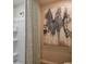 Clean bathroom featuring neutral color palette with a stand up shower and custom artwork at 3766 King Hill Dr, Haines City, FL 33844