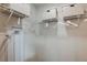 Organized walk-in closet with shelving and hanging space, providing ample storage solutions at 3766 King Hill Dr, Haines City, FL 33844