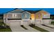 Charming townhomes feature colorful exteriors, private garages, and manicured landscaping, perfect for modern living at 3766 King Hill Dr, Haines City, FL 33844