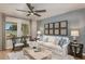 Comfortable living room with contemporary decor, stylish furniture, and ample natural light at 3766 King Hill Dr, Haines City, FL 33844