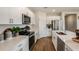 Bright kitchen with stainless steel appliances, white countertops, and ample cabinet storage at 3799 King Hill Dr, Haines City, FL 33844