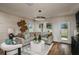 Spacious living room with stylish decor, a comfortable sectional, and abundant natural light at 3799 King Hill Dr, Haines City, FL 33844