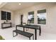 Inviting outdoor patio featuring modern furniture, creating the perfect space for relaxation at 3799 King Hill Dr, Haines City, FL 33844