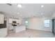 Bright and airy open-concept space combines the kitchen, dining, and living areas for easy entertaining and Gathering time at 9084 Wildlight Trl, Wildwood, FL 34785