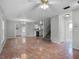 Open concept Living Room with ceiling fan and tile floors at 156 Oak Grove Rd, Winter Park, FL 32789