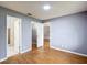 Spacious bedroom featuring hardwood floors, neutral walls, and bright natural light at 2690 Ne 42Nd Pl, Ocala, FL 34479