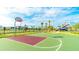 Outdoor basketball court within a gated community featuring an aquapark in the background at 4149 Paragraph Dr, Kissimmee, FL 34746