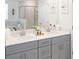 Elegant bathroom boasts a double vanity, a soaking tub, and a separate shower for a spa-like experience at 4149 Paragraph Dr, Kissimmee, FL 34746