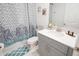 Well-lit bathroom featuring a shower-tub combo and modern vanity at 4149 Paragraph Dr, Kissimmee, FL 34746