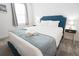 Cozy bedroom with comfortable bed and stylish accents at 4149 Paragraph Dr, Kissimmee, FL 34746