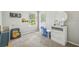 Playful bedroom with 'BUILD' decor, natural light, and -friendly furniture at 440 Langham Dr, Davenport, FL 33897