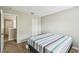 Bedroom featuring neutral paint, a bed, closet, and doorway at 440 Langham Dr, Davenport, FL 33897