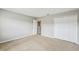 Bedroom featuring neutral walls, carpeting, a closet, and a doorway at 440 Langham Dr, Davenport, FL 33897