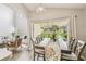 Open dining area with view to backyard at 440 Langham Dr, Davenport, FL 33897