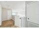 Hallway featuring neutral paint, carpeting, and doorways at 440 Langham Dr, Davenport, FL 33897