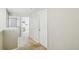 Hallway featuring neutral paint, carpeting, and doorways at 440 Langham Dr, Davenport, FL 33897
