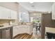 Spacious kitchen with modern appliances and an open floor plan at 440 Langham Dr, Davenport, FL 33897
