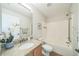 Bathroom featuring modern sink, vanity with stone countertop, and a shower over tub at 1628 Saddlehorn Dr, Lakeland, FL 33810