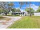 Beautiful home with a screened-in porch and a spacious yard at 4844 Creek Meadow Trl, Lakeland, FL 33810