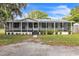 Charming single-story home with screened-in porch and well-maintained landscaping at 4844 Creek Meadow Trl, Lakeland, FL 33810