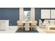 Cozy dining room with modern table, chairs, and an open floor plan at 947 Hour Glass Rd, Lakeland, FL 33801