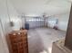 Spacious garage with automatic door, shelving, and plenty of room for parking at 1500 Fort Meade Pl, Poinciana, FL 34759