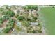 Expansive aerial view showcasing home surrounded by a well-maintained lawn and mature trees at 430 Alturas Babson Park Cutoff, Lake Wales, FL 33859