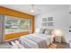 Cozy bedroom with a ceiling fan, natural light and minimalist decor at 430 Alturas Babson Park Cutoff, Lake Wales, FL 33859