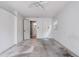 Bright bedroom with an open doorway and two closets with white walls and ceiling fan at 430 Alturas Babson Park Cutoff, Lake Wales, FL 33859