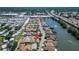 High-angle shot displaying a residential area near a lake, shopping centers, and major roadways, offering convenience and serenity at 622 Jamaica Cir, Lakeland, FL 33803