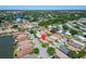 Aerial view of a residential area, highlighting the close proximity to a lake and quiet, tree-filled streets at 622 Jamaica Cir, Lakeland, FL 33803