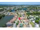 Community aerial view with lake and roadway access close by, featuring well-maintained homes and landscaping at 622 Jamaica Cir, Lakeland, FL 33803