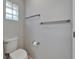 Bathroom with toilet and towel bars at 622 Jamaica Cir, Lakeland, FL 33803