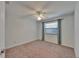 Bedroom with ceiling fan and window at 622 Jamaica Cir, Lakeland, FL 33803