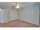 Cozy bedroom featuring a double closet and neutral carpet at 622 Jamaica Cir, Lakeland, FL 33803
