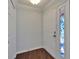 Entrance showcasing a stained-glass accent, tile flooring, and a storage closet at 622 Jamaica Cir, Lakeland, FL 33803