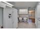 A view of the kitchen, refrigerator and office space at 622 Jamaica Cir, Lakeland, FL 33803
