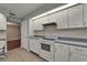 Bright kitchen featuring white appliances and eat-in area at 622 Jamaica Cir, Lakeland, FL 33803