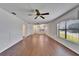 Open living room features hardwood floors and plenty of natural light at 622 Jamaica Cir, Lakeland, FL 33803