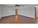 Inviting living room with hardwood floors, ceiling fan and bright natural light at 622 Jamaica Cir, Lakeland, FL 33803