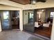 Covered patio with views of the living and dining areas, perfect for seamless indoor-outdoor living at 8212 Borgia Ct, Orlando, FL 32836