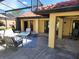 Covered patio with a seating area and tiled roof, perfect for outdoor entertaining at 8212 Borgia Ct, Orlando, FL 32836