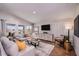 Comfortable living room featuring a neutral color palette, modern decor, and lots of natural light at 1034 Foreshore Ln, Haines City, FL 33844