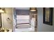 Bright bathroom showcasing a luxurious soaking tub and stylish decor at 210 Cheshire Way, Davenport, FL 33897