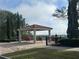Community pavilion with beautiful benches, plants and stunning overlook view at 3205 Sonesta Ct # B, Clermont, FL 34711