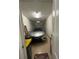Garage featuring a parked car, offering secure parking and additional storage solutions for homeowners at 3205 Sonesta Ct # B, Clermont, FL 34711