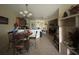 Open-concept kitchen and dining area with ample counter space and a seamless flow to living spaces at 3205 Sonesta Ct # B, Clermont, FL 34711